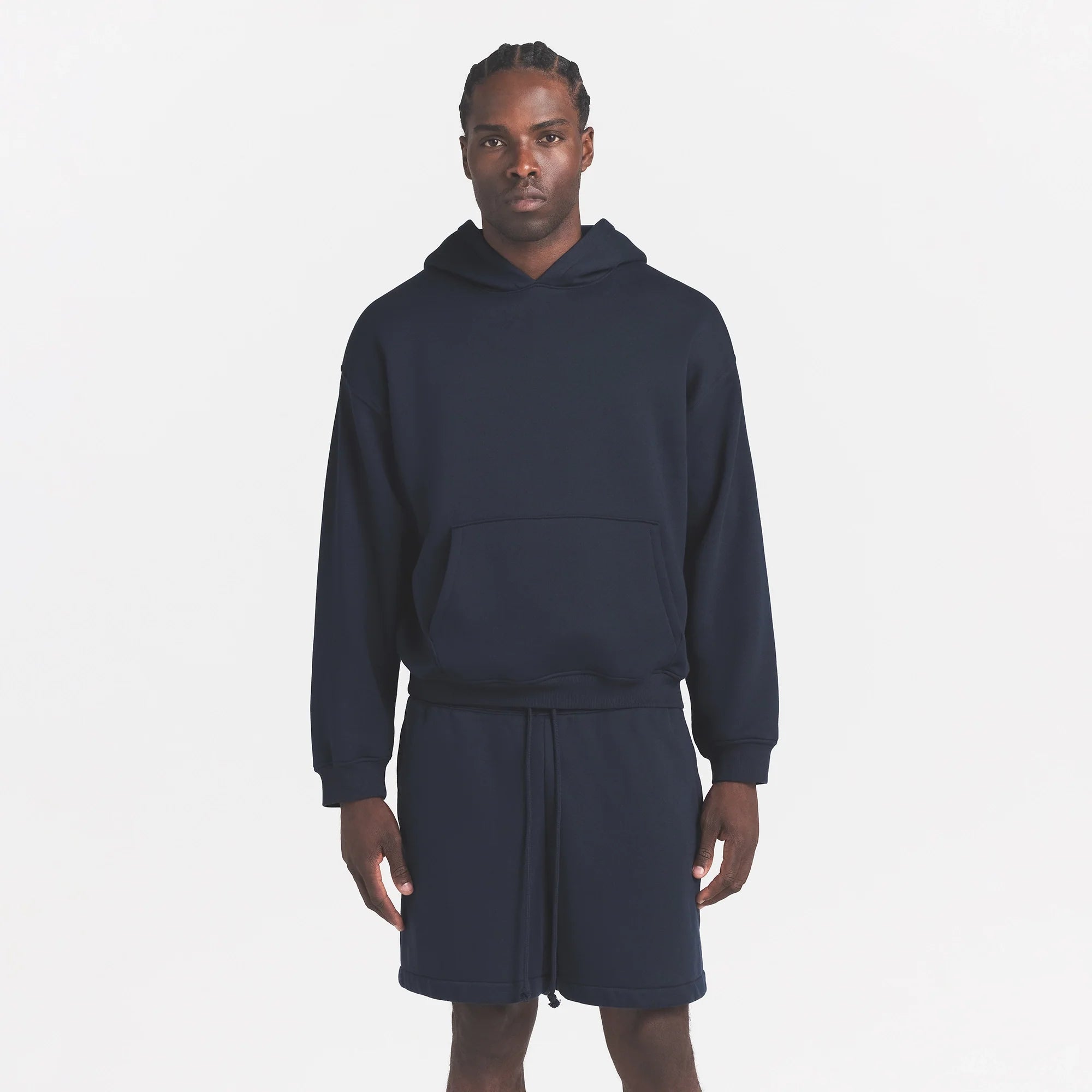FLEECE LOUNGE MENS RELAXED SHORT | NAVY ON A MODEL FRONT VIEW @ | FOCUS: 0.0, 1.0, 0.9