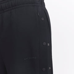 NikeSKIMS MATTE TRICOT SIDE SNAPS PANT | OBSIDIAN ON A MODEL SIDE VIEW @ | FOCUS: 0.0, 1.0, 0.9