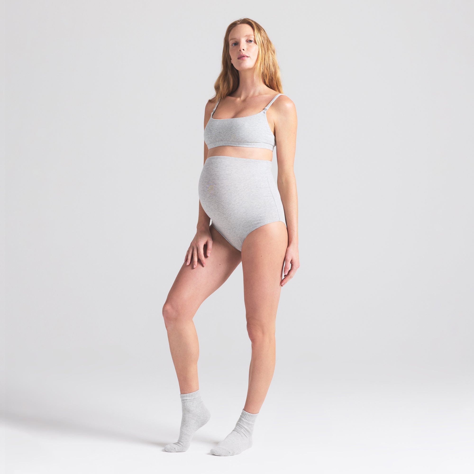 COTTON JERSEY MATERNITY HIGH-WAISTED BRIEF | LIGHT HEATHER GREY ON A MODEL FRONT VIEW | FOCUS: 0.0, 1.0, 0.9