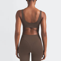 NikeSKIMS MATTE SCOOP NECK BRA | DARK SEPIA ON A MODEL BACK VIEW