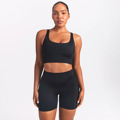 NikeSKIMS SHINE SCOOP NECK BRA TOP | OBSIDIAN ON A MODEL SIDE VIEW @ | FOCUS: 0.0, 1.0, 0.9