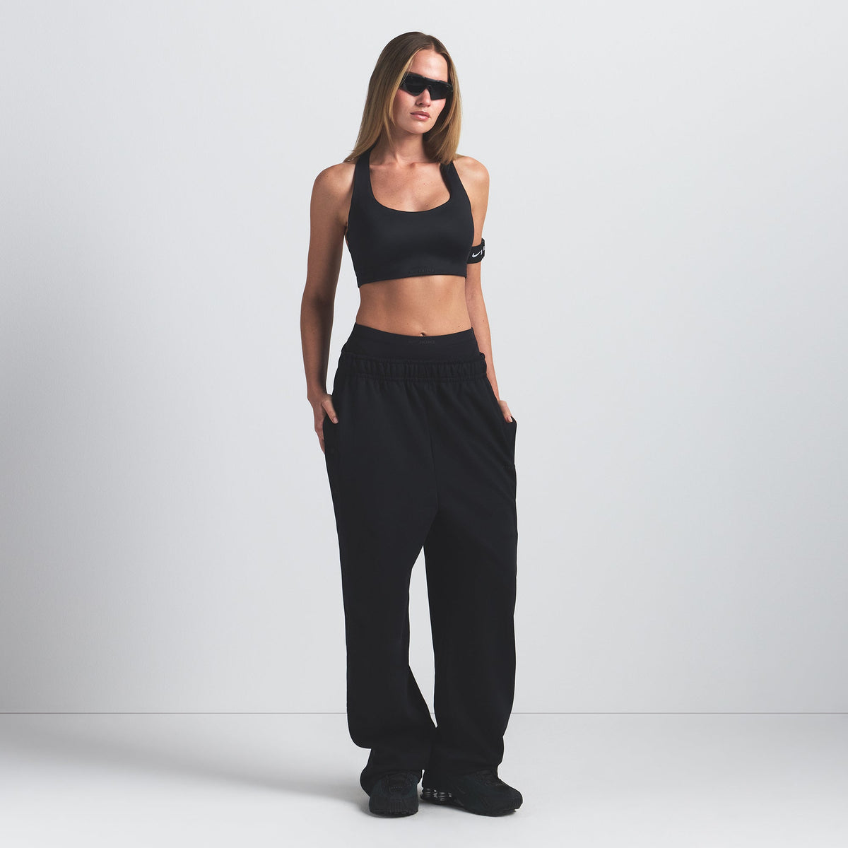 NikeSKIMS SHINE RACER BACK BRA | OBSIDIAN ON A MODEL FRONT VIEW @ | FOCUS: 0.9, 0.1, 0.7