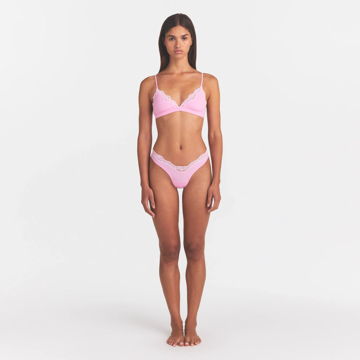 FITS EVERYBODY LACE TRIANGLE BRALETTE | BUBBLEGUM TONAL ON A MODEL FRONT VIEW