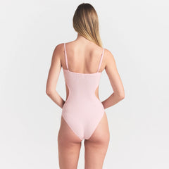 COTTON RIB CUT OUT BODYSUIT | CHERRY BLOSSOM ON A MODEL SIDE VIEW @ | FOCUS: 0.0, 1.0, 0.9