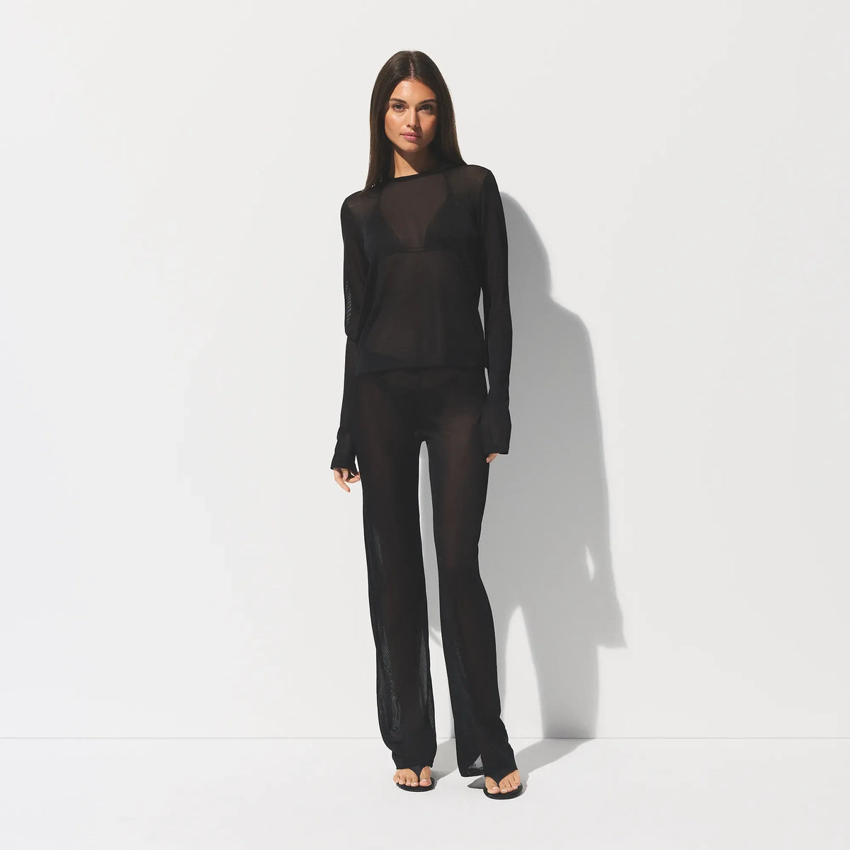 SLINKY KNIT LOW RISE PANT | OBSIDIAN ON A MODEL FRONT VIEW @ | FOCUS: 0.0, 1.0, 0.9