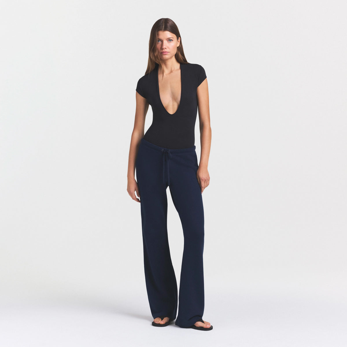 DRAPEY FRENCH TERRY STRAIGHT LEG PANT | NAVY ON A MODEL FRONT VIEW @ | FOCUS: 0.0, 1.0, 0.9