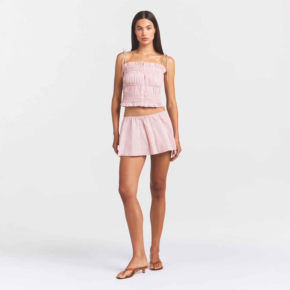 COTTON POPLIN MINI SKIRT | DUSTY PINK ON A MODEL FRONT VIEW @ | FOCUS: 0.0, 1.0, 0.9