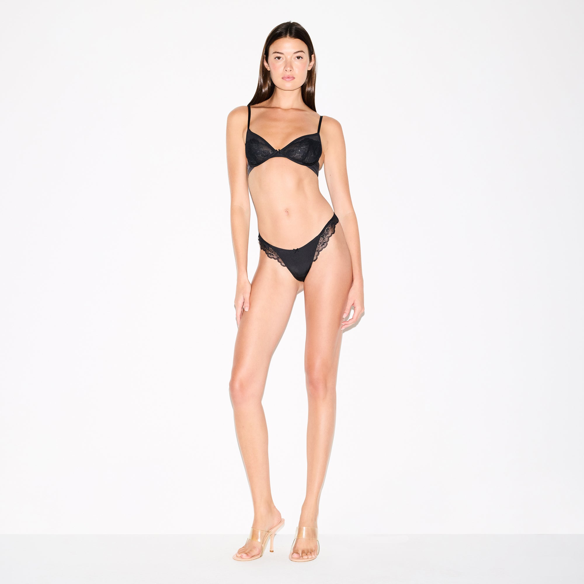 SKIMS LACE UNLINED DEMI BRA | ONYX ON A MODEL FRONT VIEW @ | FOCUS: 0.0, 1.0, 0.9