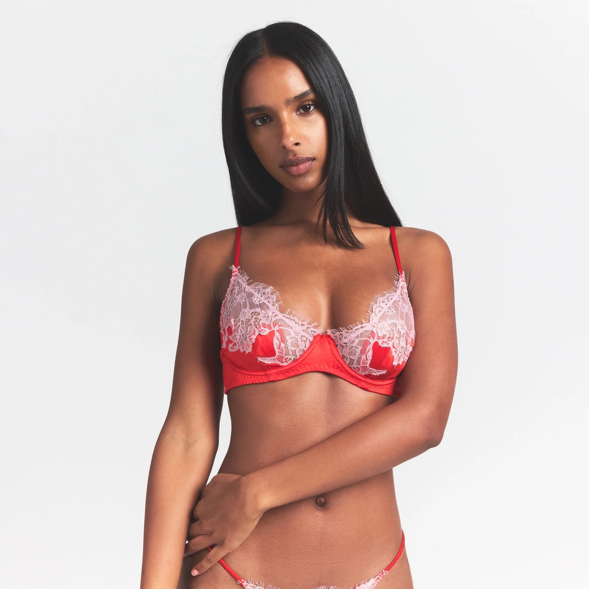 SILK LACE UNLINED DEMI BRA | RUBY CONTRAST ON A MODEL SIDE VIEW @ | FOCUS: 0.0, 1.0, 0.9