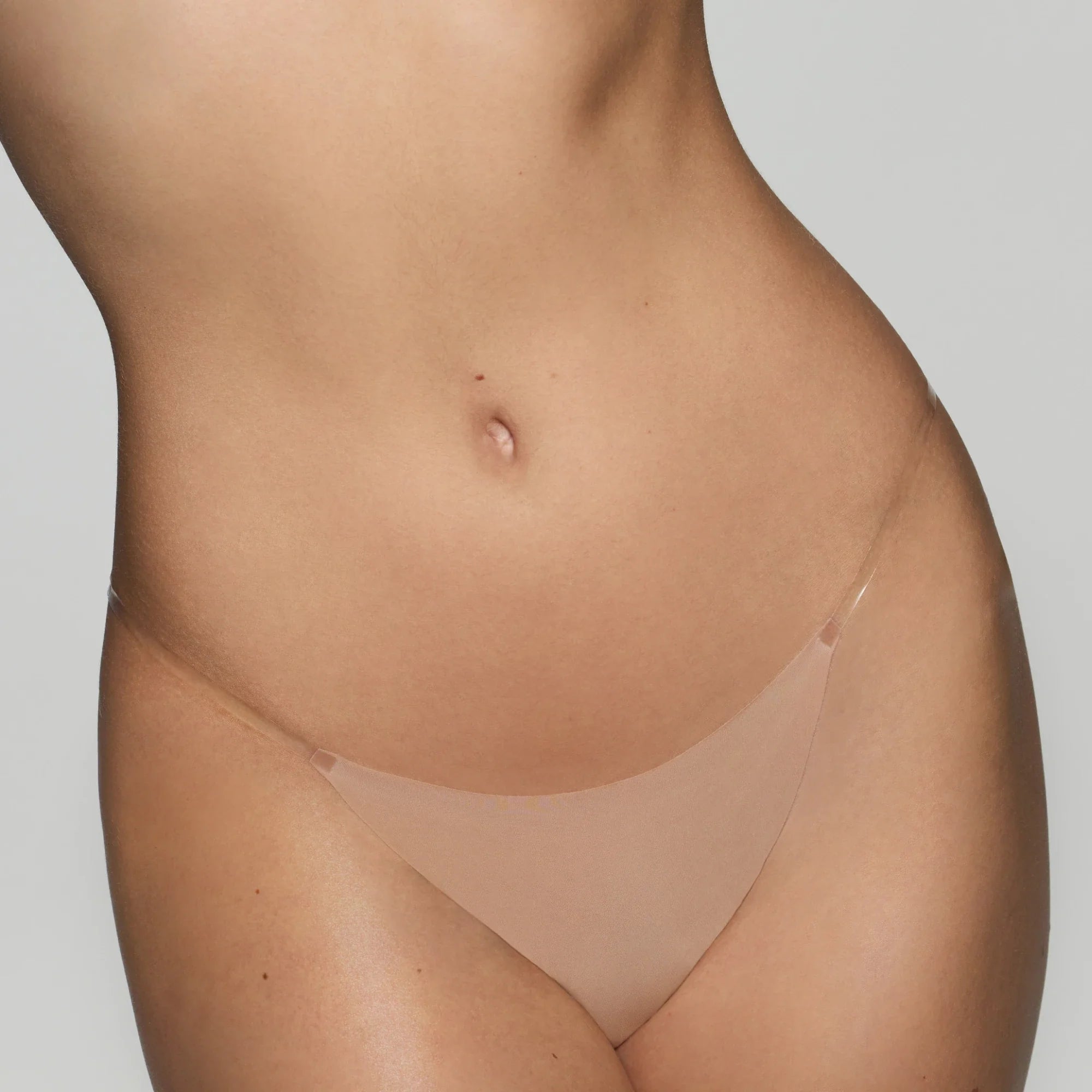 INVISIBLE CLEAR STRAP STRING THONG | ONYX ON A MODEL SIDE VIEW @ | FOCUS: 0.0, 1.0, 0.9