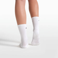 NikeSKIMS ACCESSORIES DRI-FIT PILATES GRIP CREW SOCK | SNOW FLAT ON A WHITE BACKGROUND