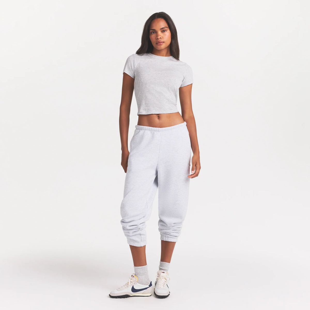 COTTON FLEECE CLASSIC JOGGER | LIGHT HEATHER GREY ON A MODEL FRONT VIEW @ | FOCUS: 0.0, 1.0, 0.9