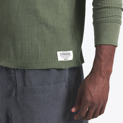 WAFFLE MENS LONG SLEEVE TOP | MILITARY GREEN ON A MODEL SIDE VIEW @ | FOCUS: 0.0, 1.0, 0.9