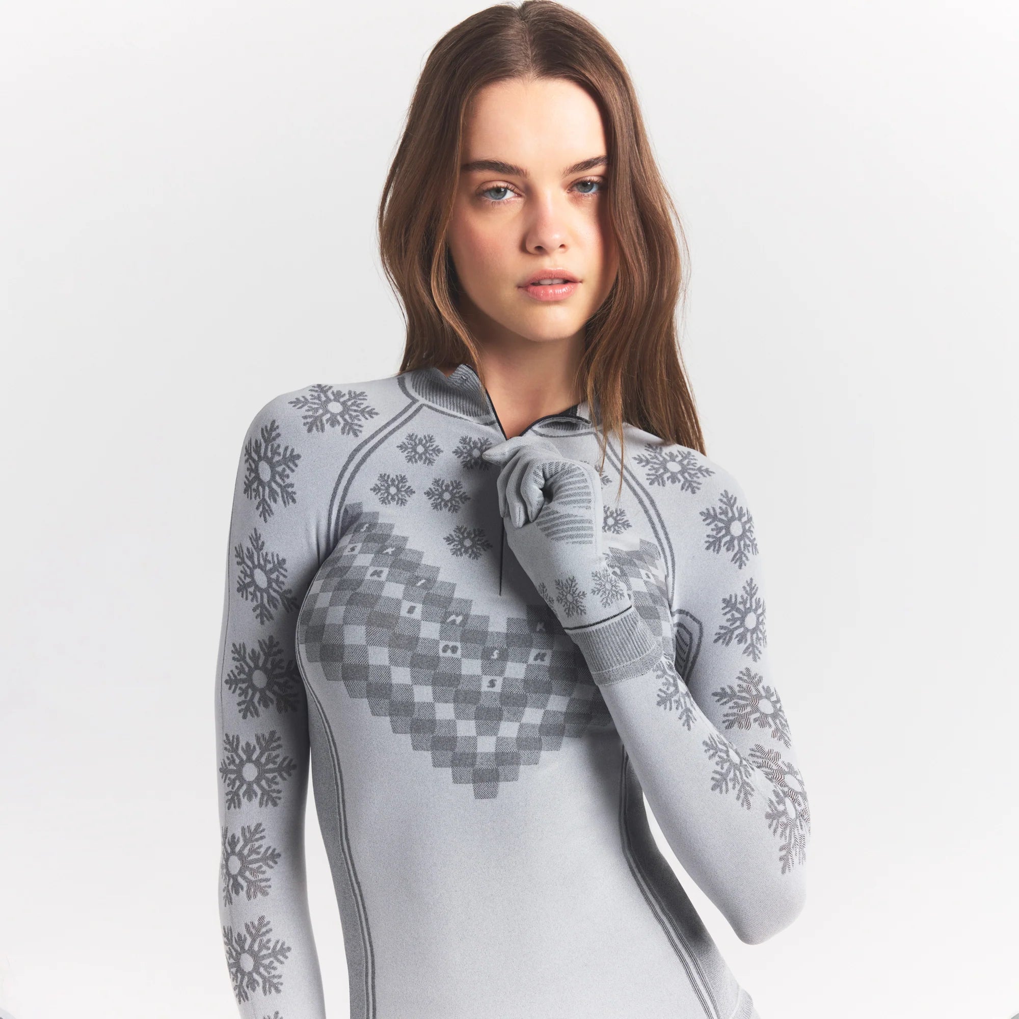 SKIMS FIRST LAYERS HALF ZIP LONG SLEEVE | MIRROR WINTER FAIR ISLE ON A MODEL SIDE VIEW @ | FOCUS: 0.0, 1.0, 0.9