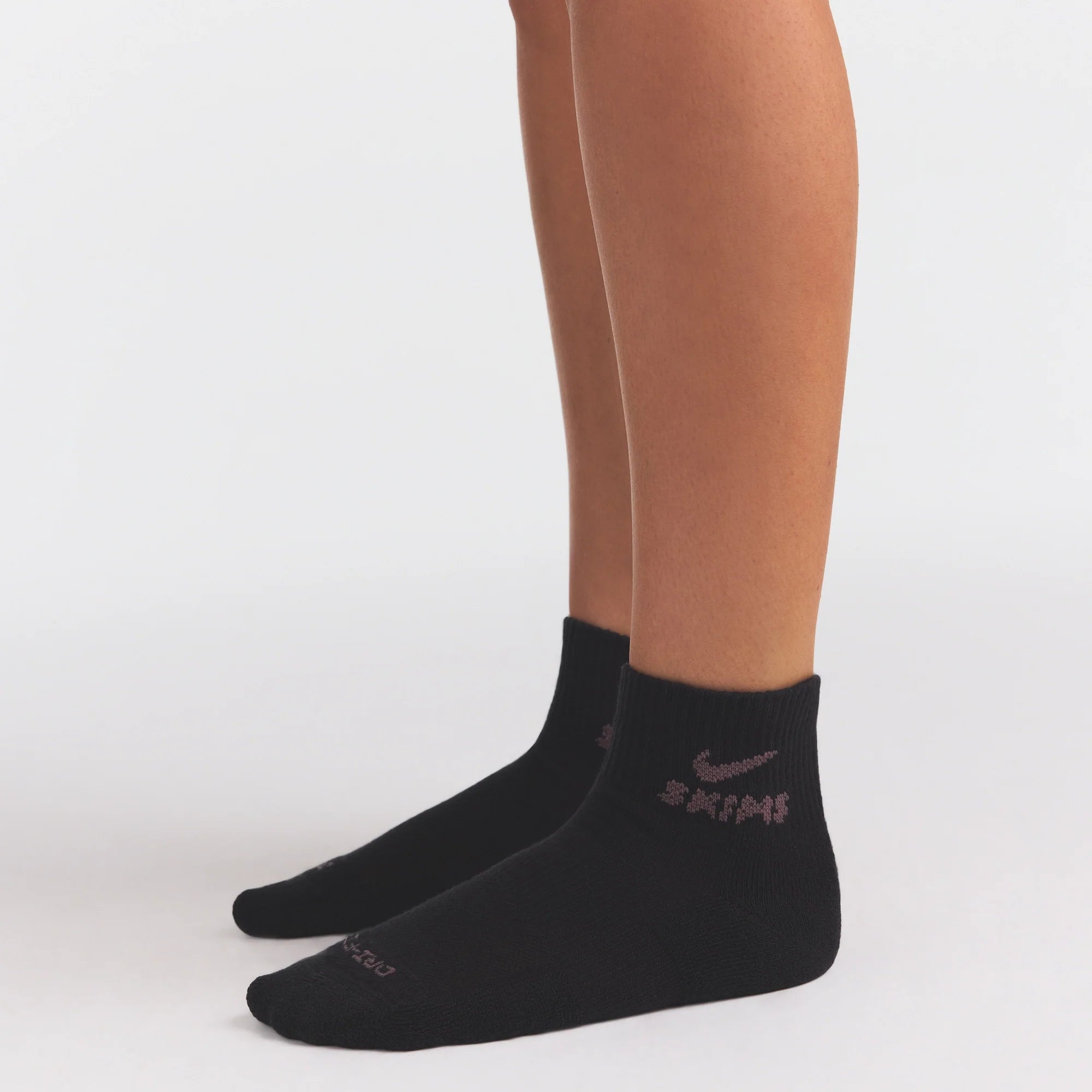NikeSKIMS ACCESSORIES DRI-FIT? QUARTER CREW SOCK 3-PACK | COBALT MULTI ON A MODEL SIDE VIEW @ | FOCUS: 0.0, 1.0, 0.9