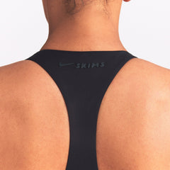 NikeSKIMS MATTE AND SHINE RACERBACK 5" ONE PIECE | OBSIDIAN/IGNEOUS ON A MODEL SIDE VIEW @ | FOCUS: 0.0, 1.0, 0.9