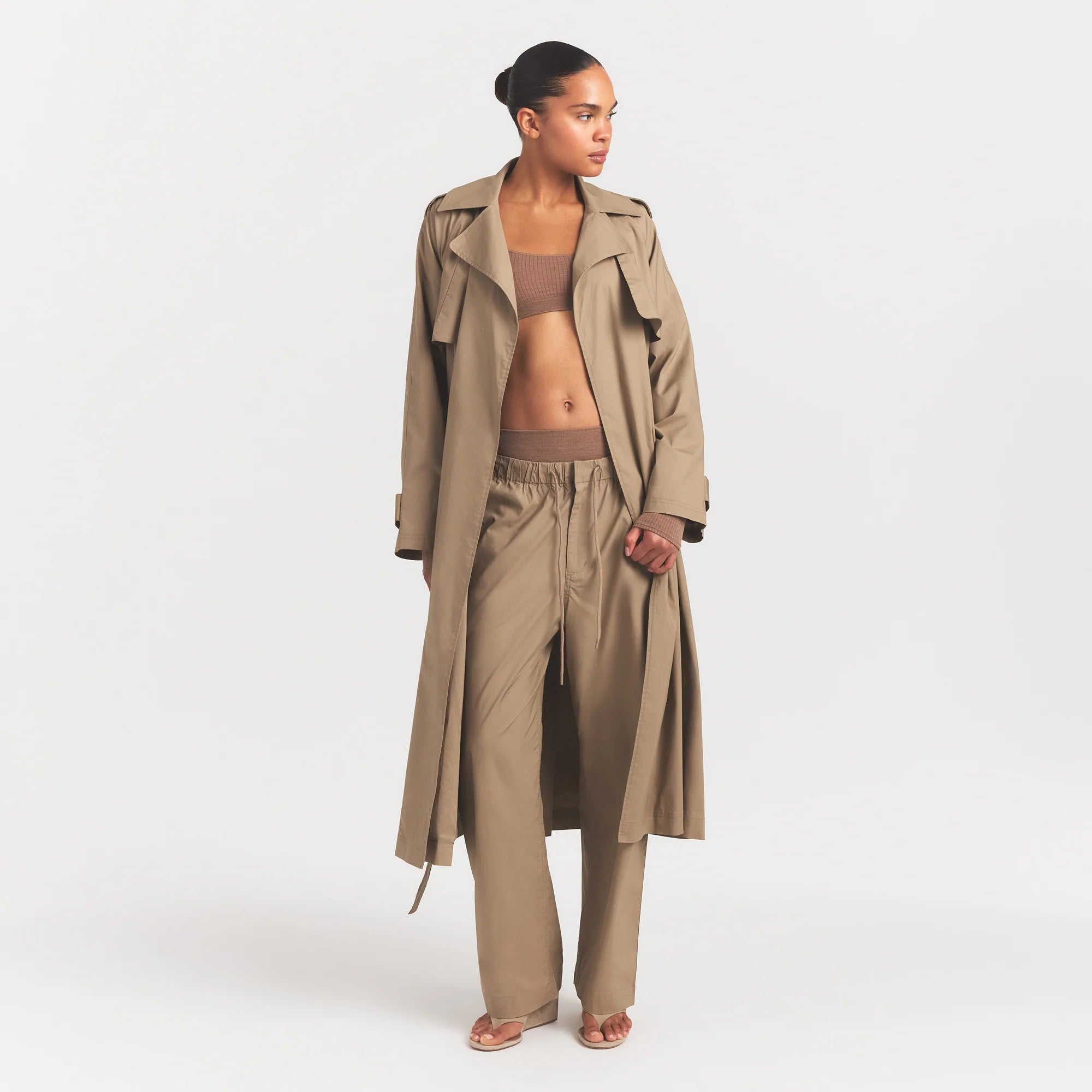 WOVEN COTTON OVERSIZED TRENCH COAT | DESERT ON A MODEL FRONT VIEW @ | FOCUS: 0.0, 1.0, 0.9