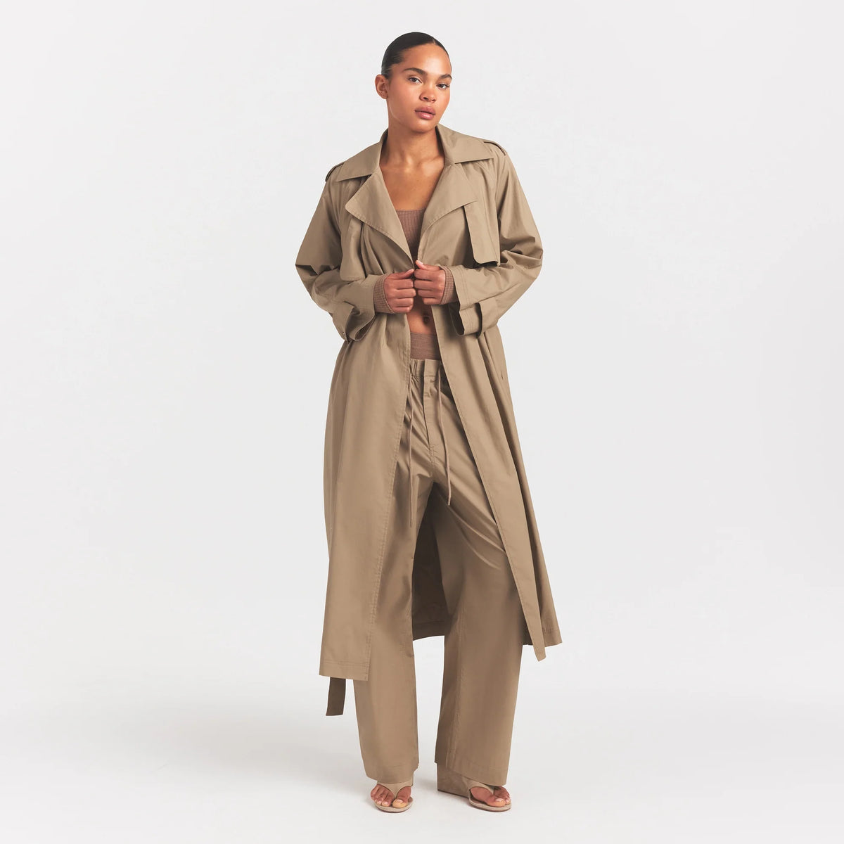 WOVEN COTTON OVERSIZED TRENCH COAT | DESERT ON A MODEL FRONT VIEW @ | FOCUS: 0.0, 1.0, 0.9