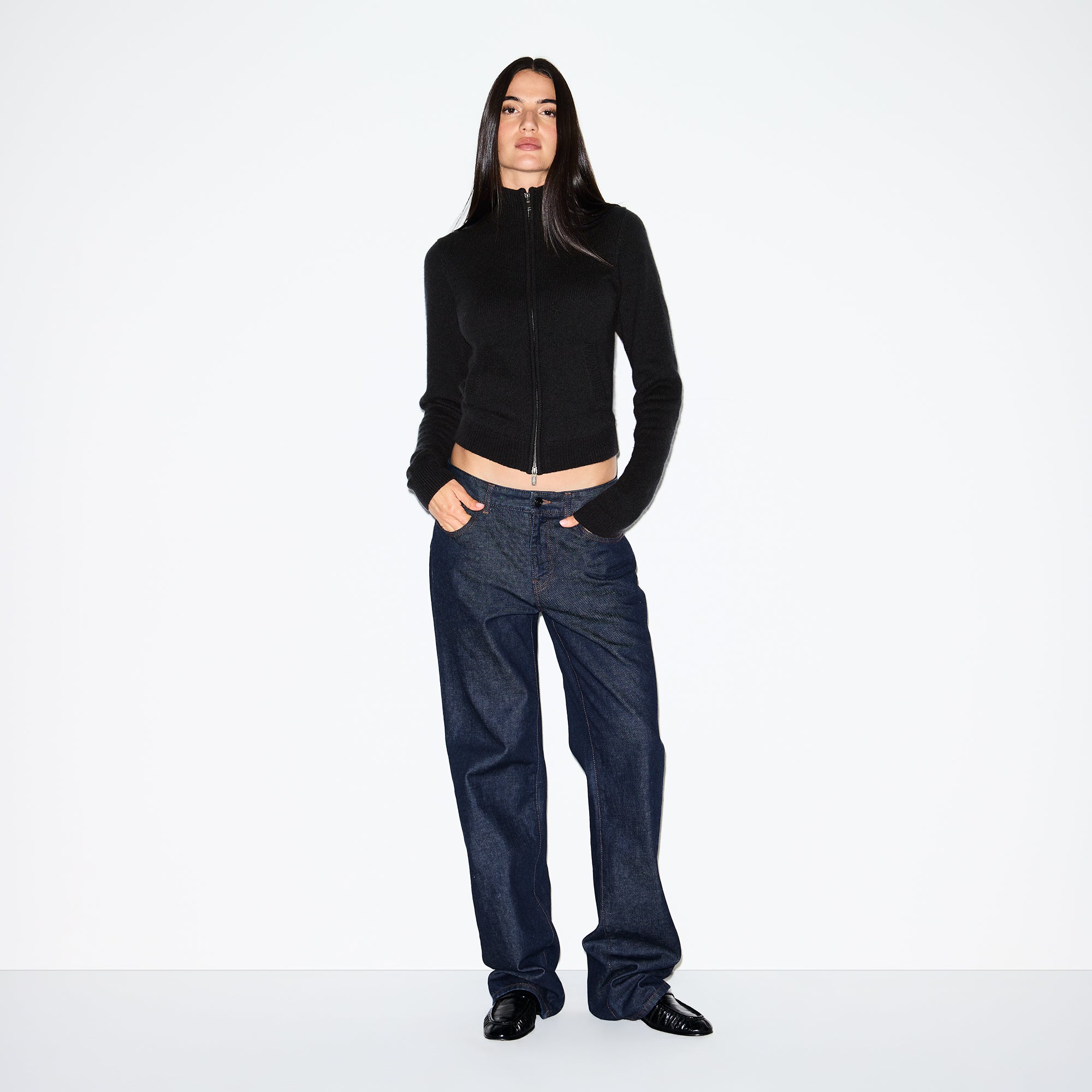 WOOL CASHMERE ZIP UP MOCK NECK SWEATER | ONYX ON A MODEL FRONT VIEW @ | FOCUS: 0.0, 1.0, 0.9