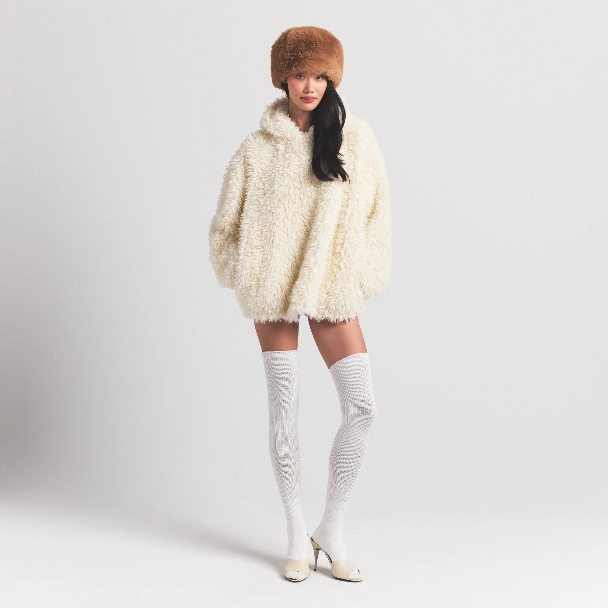 FAUX FUR HOODIE | EGRET ON A MODEL FRONT VIEW @ | FOCUS: 0.0, 1.0, 0.9