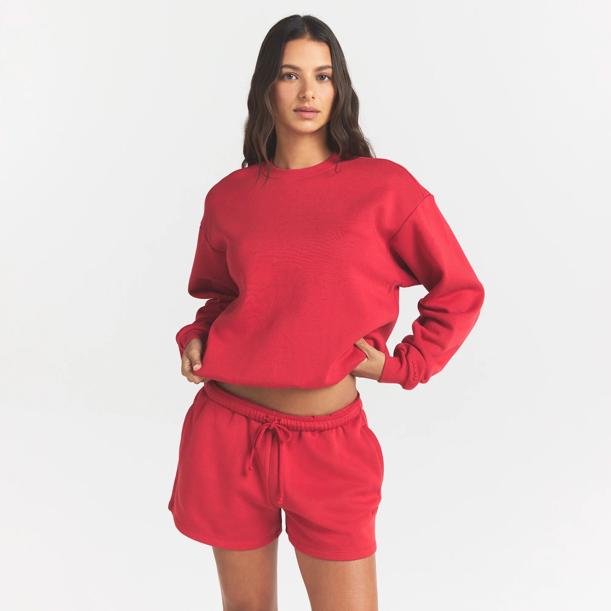 COTTON FLEECE CLASSIC CREWNECK | WASHED RED ON A MODEL SIDE VIEW @ | FOCUS: 0.0, 1.0, 0.9