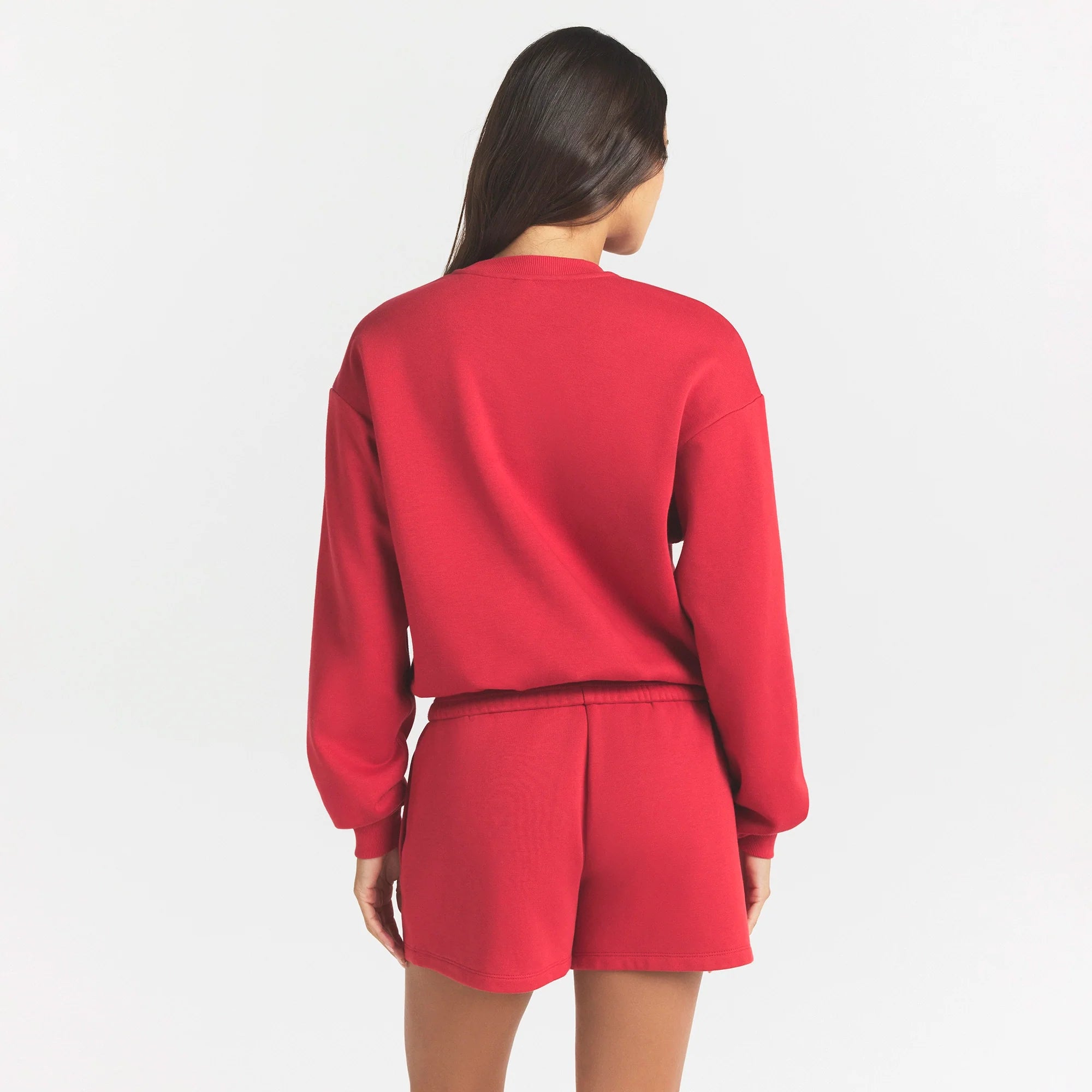 COTTON FLEECE CLASSIC CREWNECK | WASHED RED ON A MODEL SIDE VIEW @ | FOCUS: 0.0, 1.0, 0.9