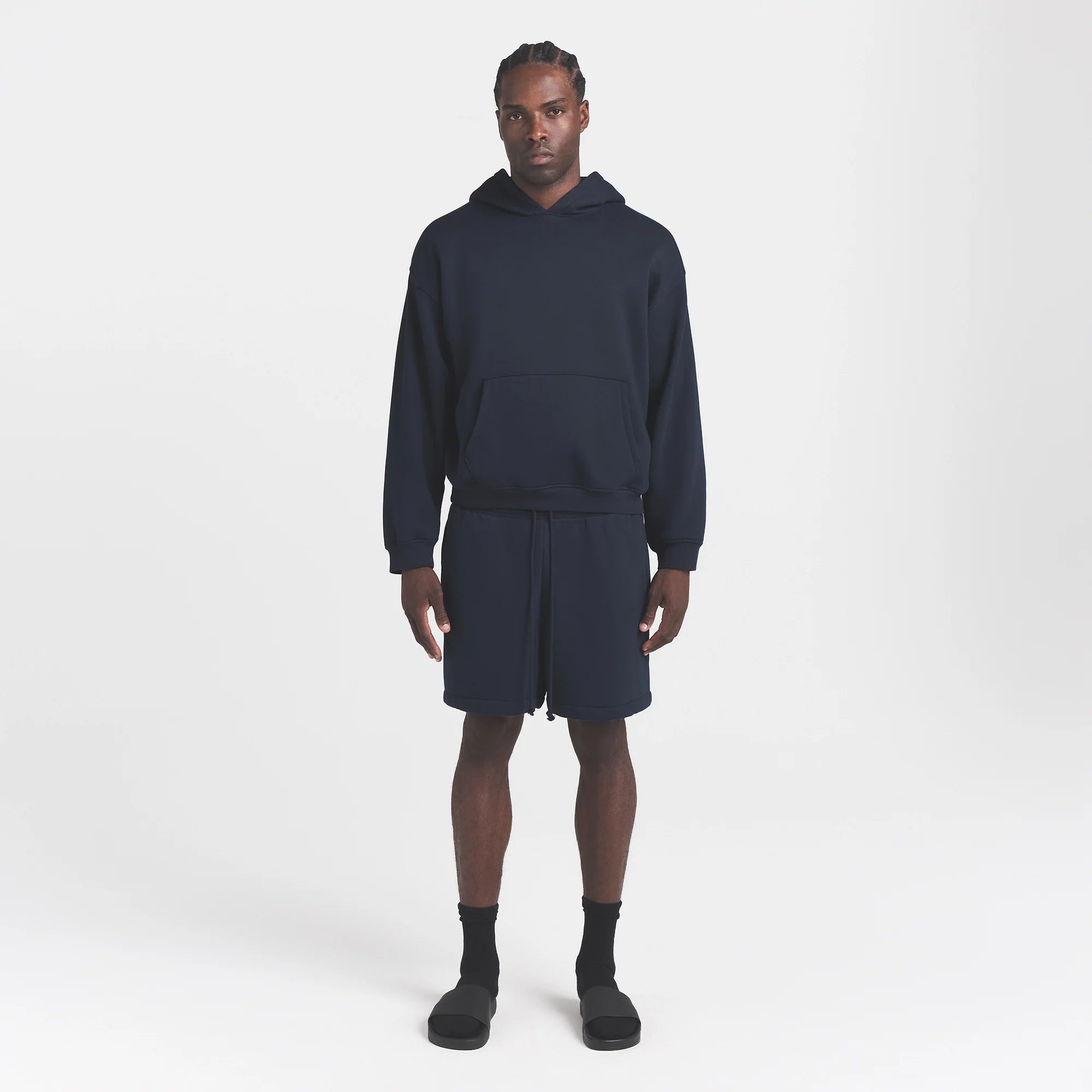 FLEECE LOUNGE MENS RELAXED HOODIE | NAVY ON A MODEL FRONT VIEW @ | FOCUS: 0.0, 1.0, 0.9