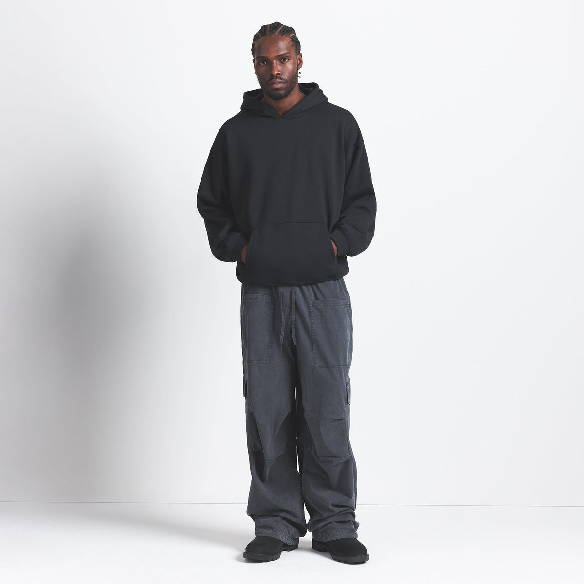 FLEECE LOUNGE MENS RELAXED HOODIE | WASHED ONYX ON A MODEL FRONT VIEW @ | FOCUS: 0.0, 1.0, 0.9