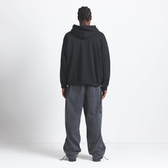 FLEECE LOUNGE MENS RELAXED HOODIE | WASHED ONYX ON A MODEL BACK VIEW @ | FOCUS: 0.0, 1.0, 0.9