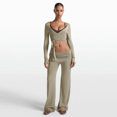 NikeSKIMS STRETCH KNIT FOLDOVER WIDE LEG PANT | DUNE ON A MODEL FRONT VIEW @ | FOCUS: 0.0, 1.0, 0.9