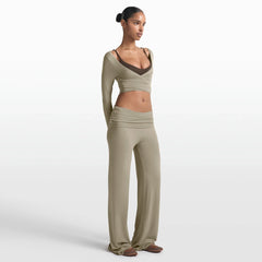 NikeSKIMS STRETCH KNIT FOLDOVER WIDE LEG PANT | DUNE ON A MODEL FRONT VIEW @ | FOCUS: 0.0, 1.0, 0.9