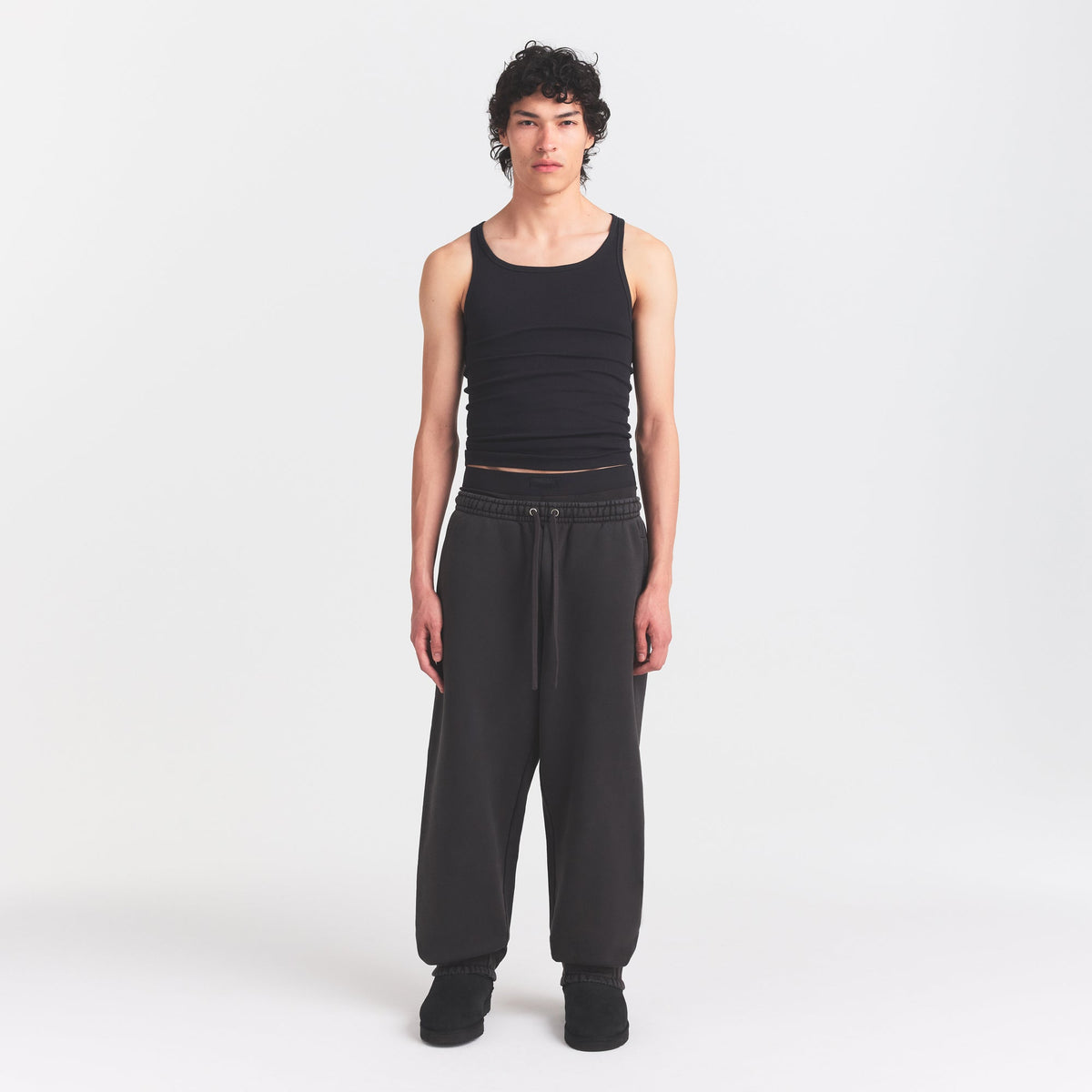 HEAVYWEIGHT FLEECE MENS JOGGER | WASHED ONYX ON A MODEL FRONT VIEW @ | FOCUS: 0.0, 1.0, 0.9