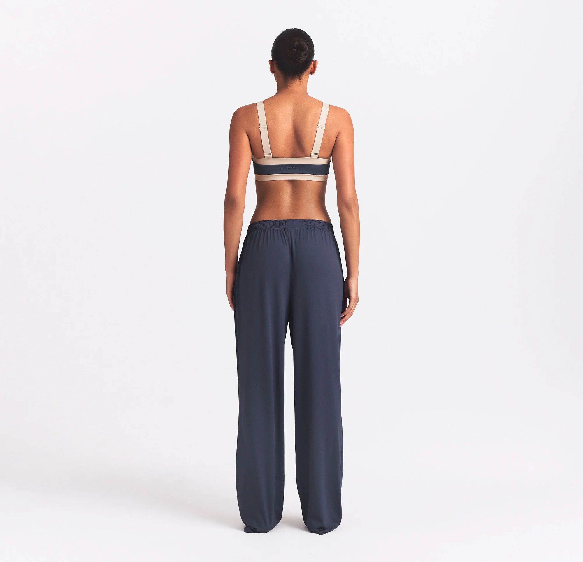 NikeSKIMS AIRY WIDE LEG PANT | DEEP ROYAL ON A MODEL SIDE VIEW @ | FOCUS: 0.0, 1.0, 0.9