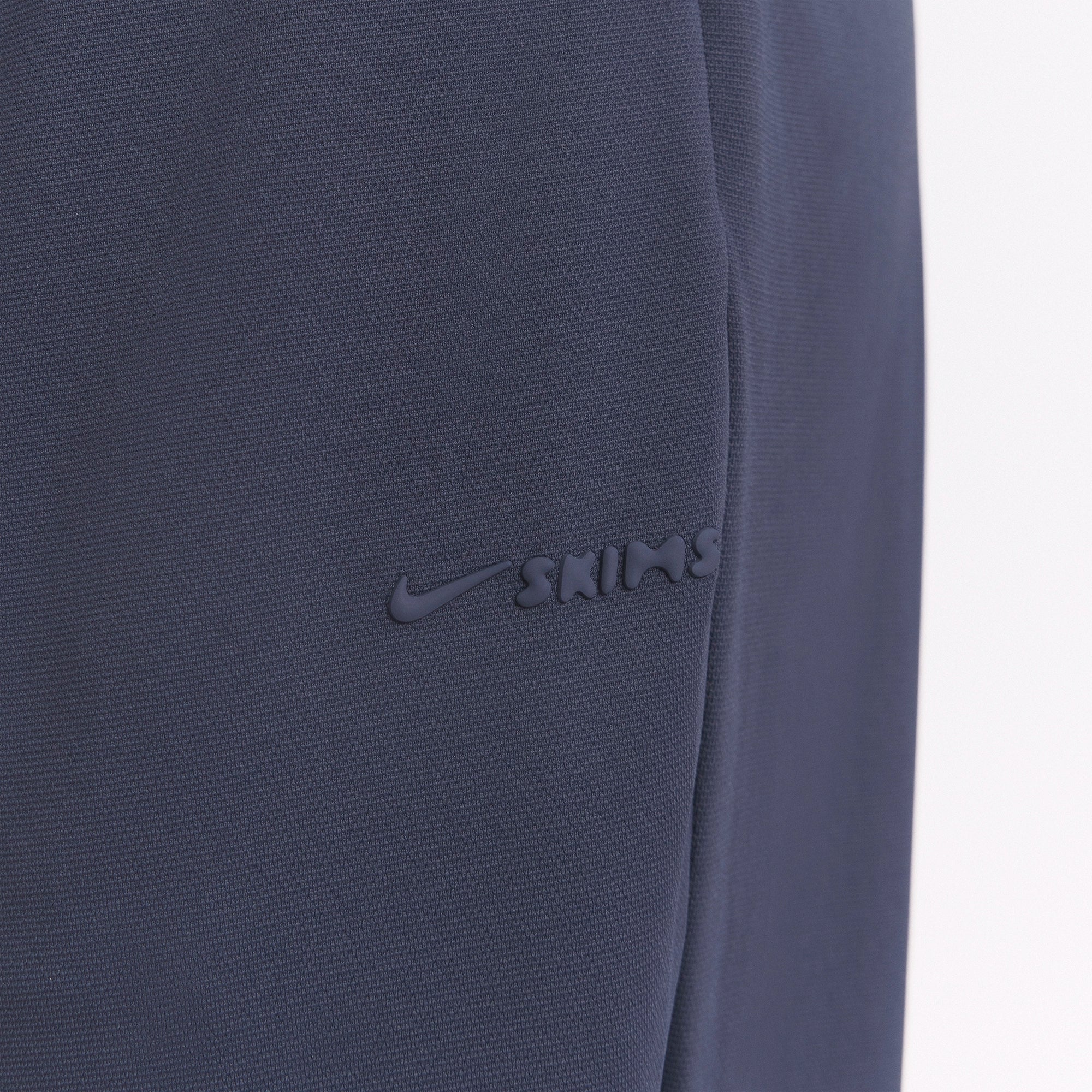 NikeSKIMS AIRY WIDE LEG PANT | DEEP ROYAL ON A MODEL SIDE VIEW @ | FOCUS: 0.0, 1.0, 0.9
