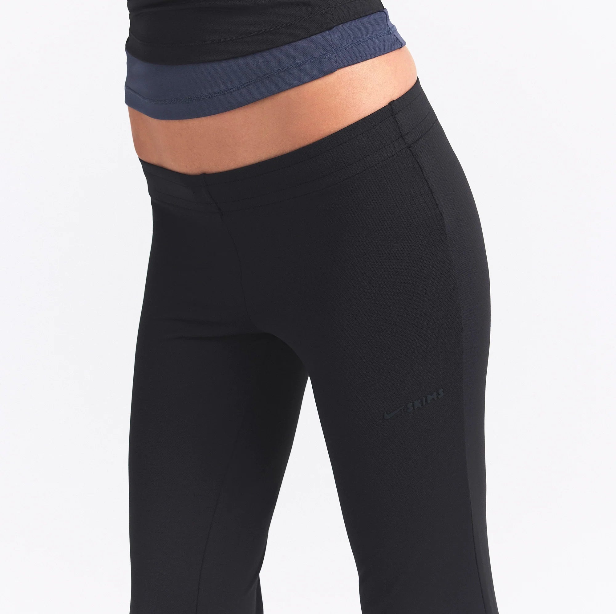 NikeSKIMS AIRY STRAIGHT LEG PANT | OBSIDIAN ON A MODEL SIDE VIEW @ | FOCUS: 0.0, 1.0, 0.9
