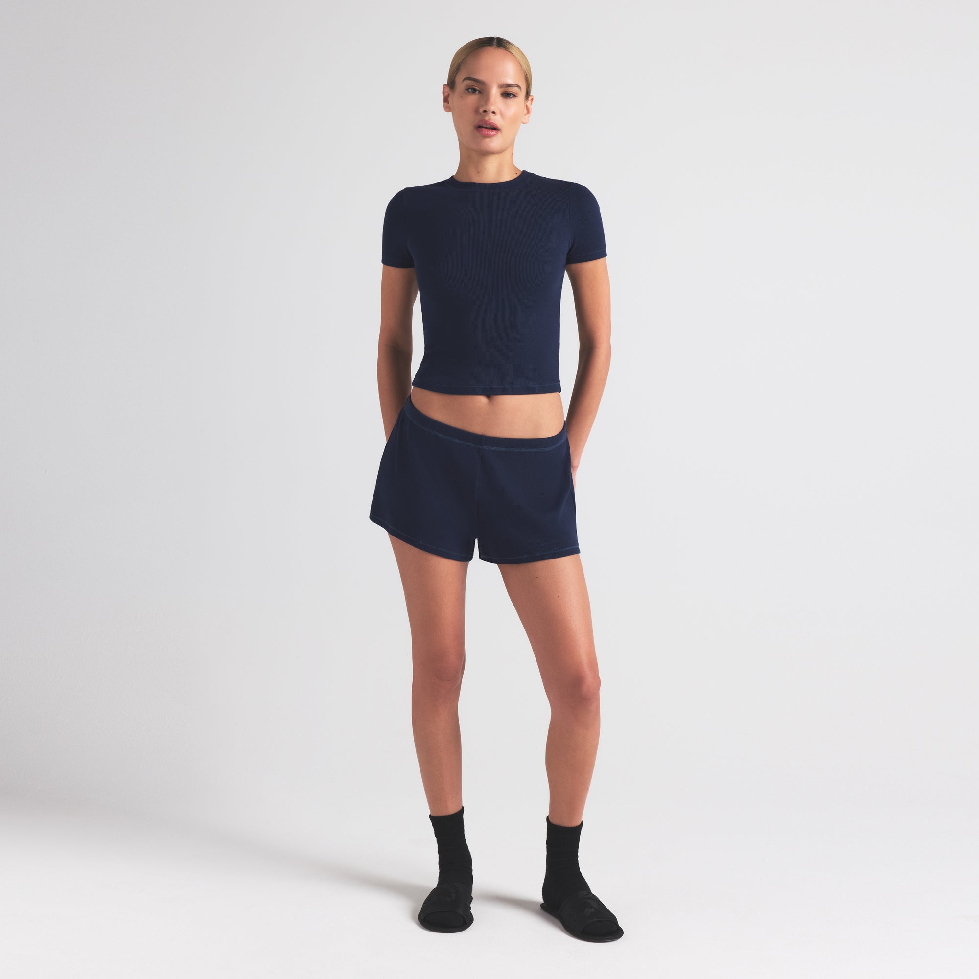 COTTON RIB LOOSE SHORT | NAVY ON A MODEL FRONT VIEW | FOCUS: 0.0, 1.0, 0.9