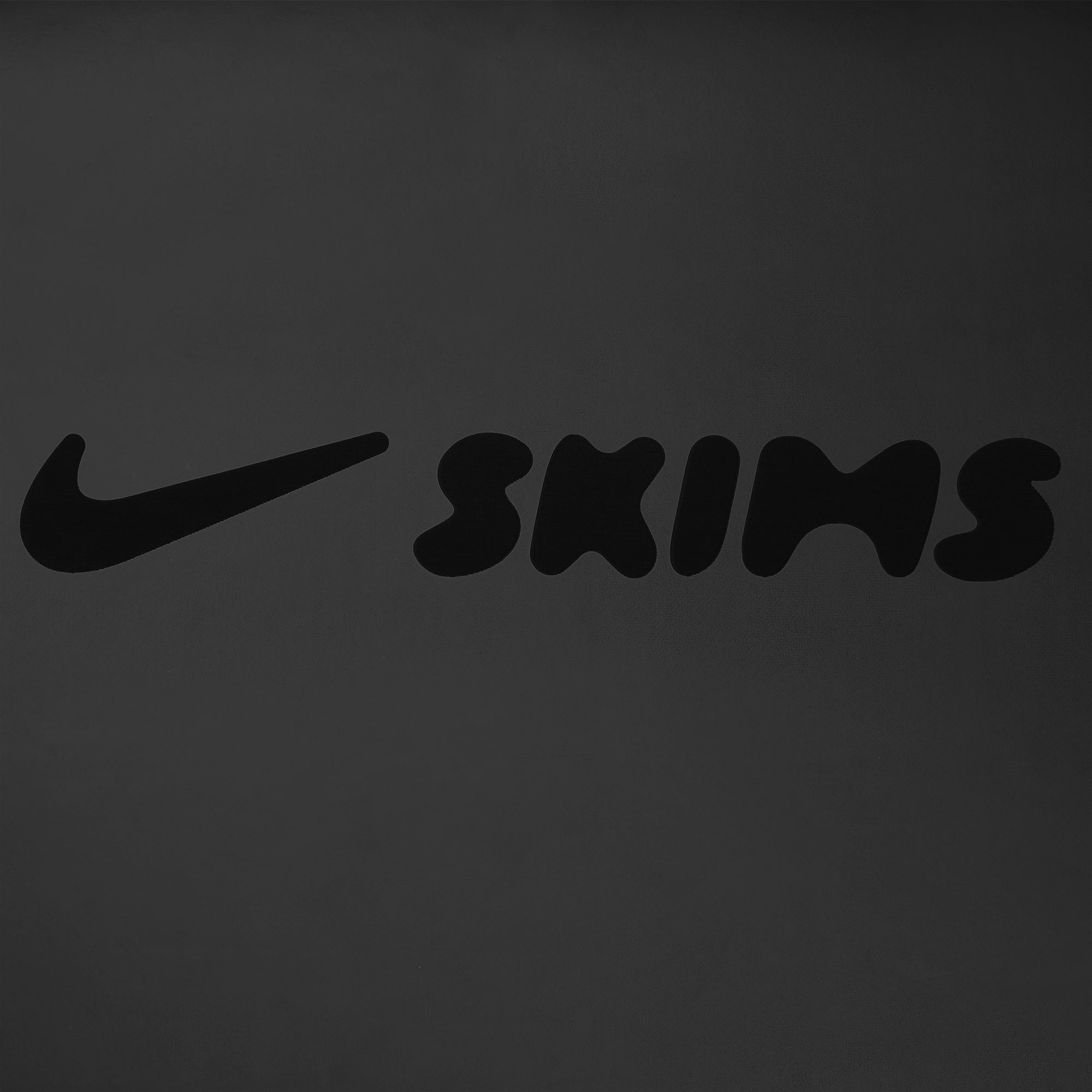 NikeSKIMS YOGA MAT | OBSIDIAN FLAT ON A WHITE BACKGROUND | FLT