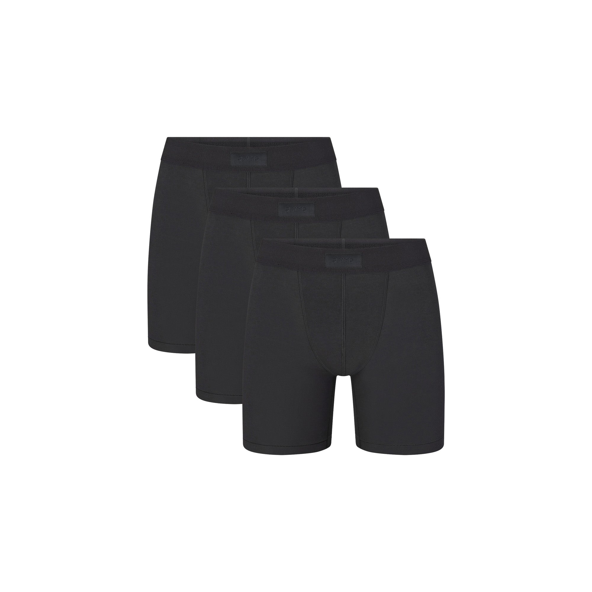 SKIMS COTTON MENS 5" BOXER BRIEF 3-PACK | ONYX (MENS BOXERS, MENS UNDERWEAR) LAYS FLAT ON A WHITE BACKGROUND | FLT  | FOCUS: 0.0, 1.0, 0.9