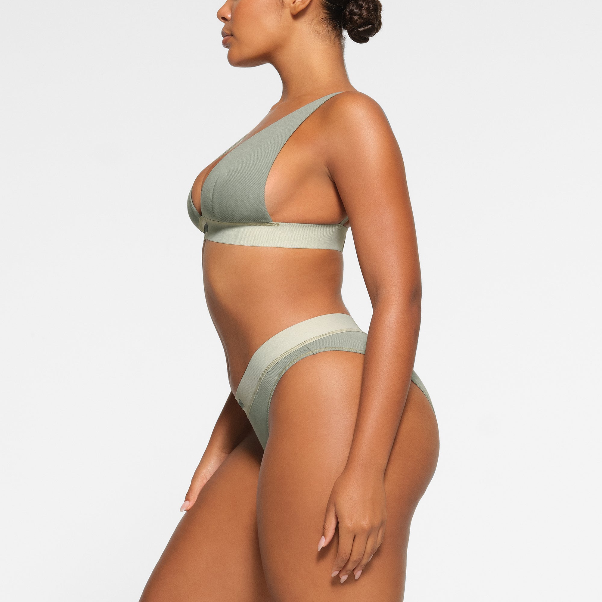 COTTON PLUNGE BRALETTE WORN BY A MODEL IN SIDE VIEW