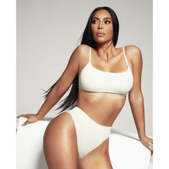A MODEL WEARS THE COTTON JERSEY SCOOP BRALETTE IN A STYLED CAMPAIGN PHOTOSHOOT