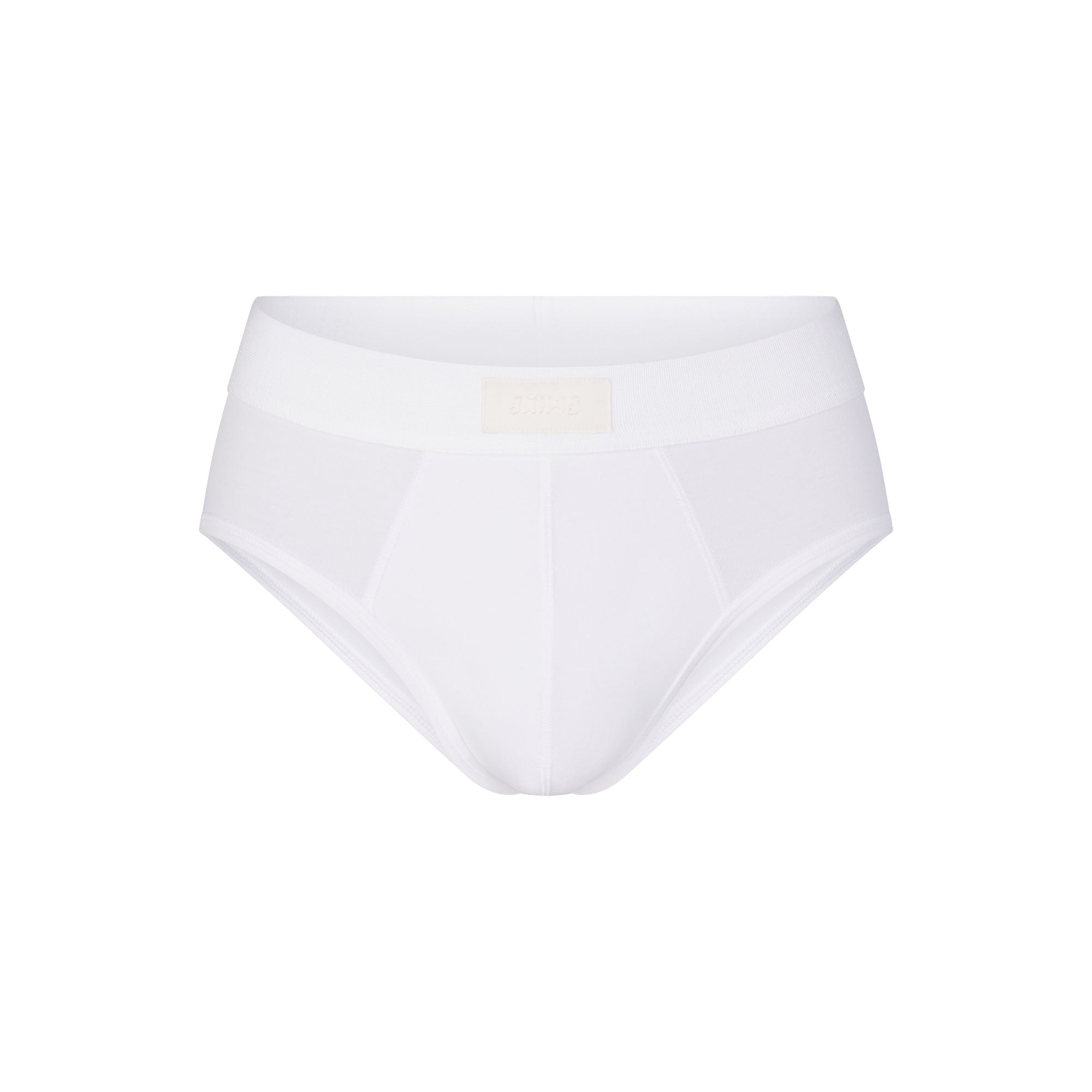 SKIMS COTTON MENS BRIEF | CHALK (MENS BRIEFS, MENS UNDERWEAR) LAYS FLAT ON A WHITE BACKGROUND | FLT