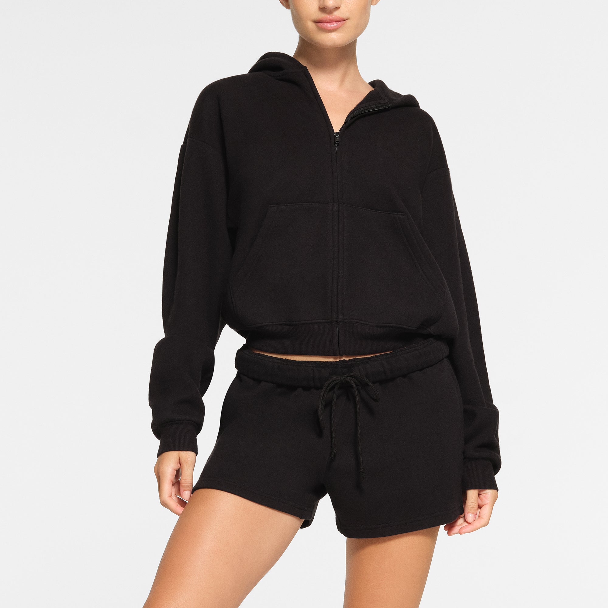 COTTON FLEECE CLASSIC ZIP UP HOODIE WORN BY A MODEL IN FRONT VIEW