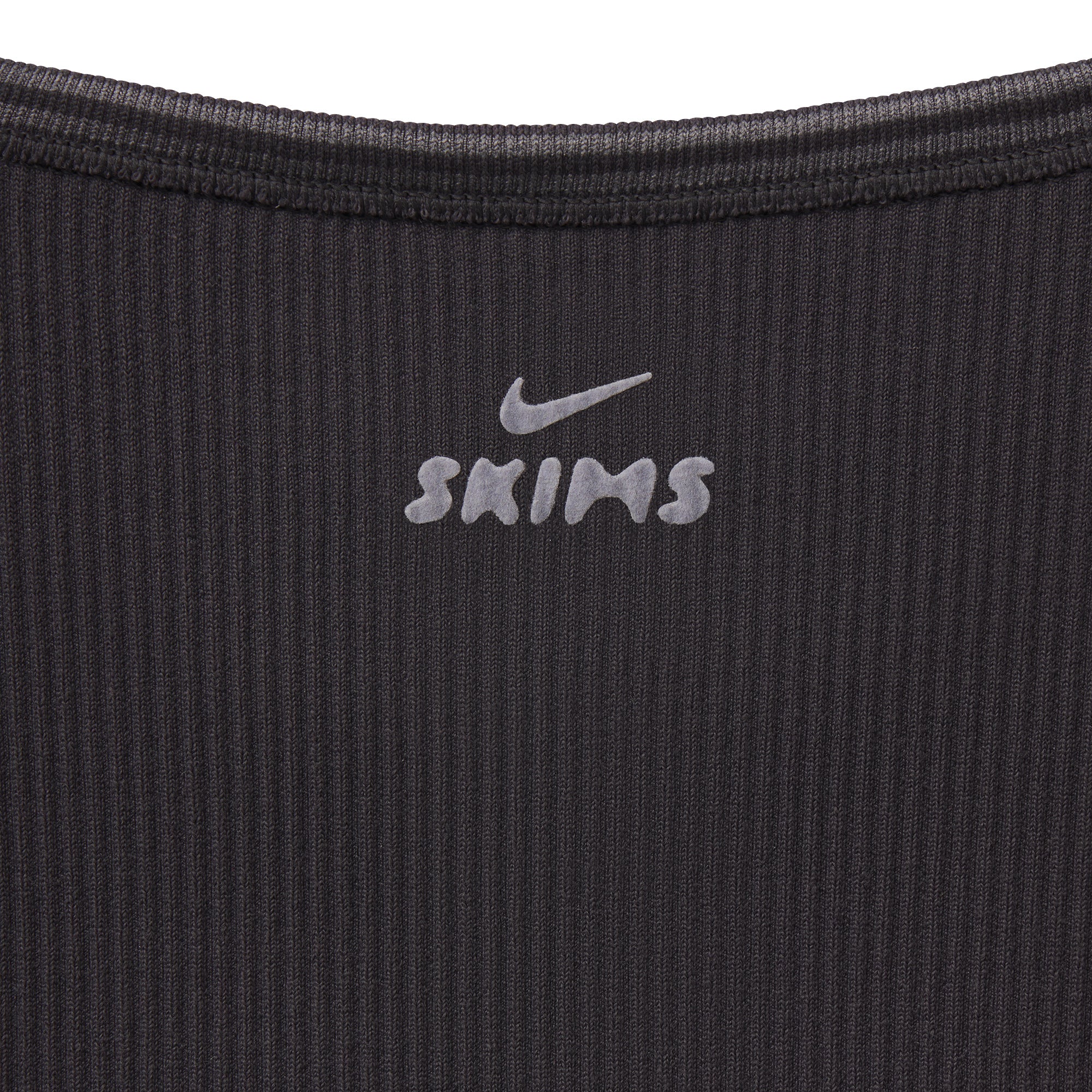 NikeSKIMS RIBBED SEAMLESS CAMI | OBSIDIAN & LAYS FLAT ON A WHITE BACKGROUND | FLT