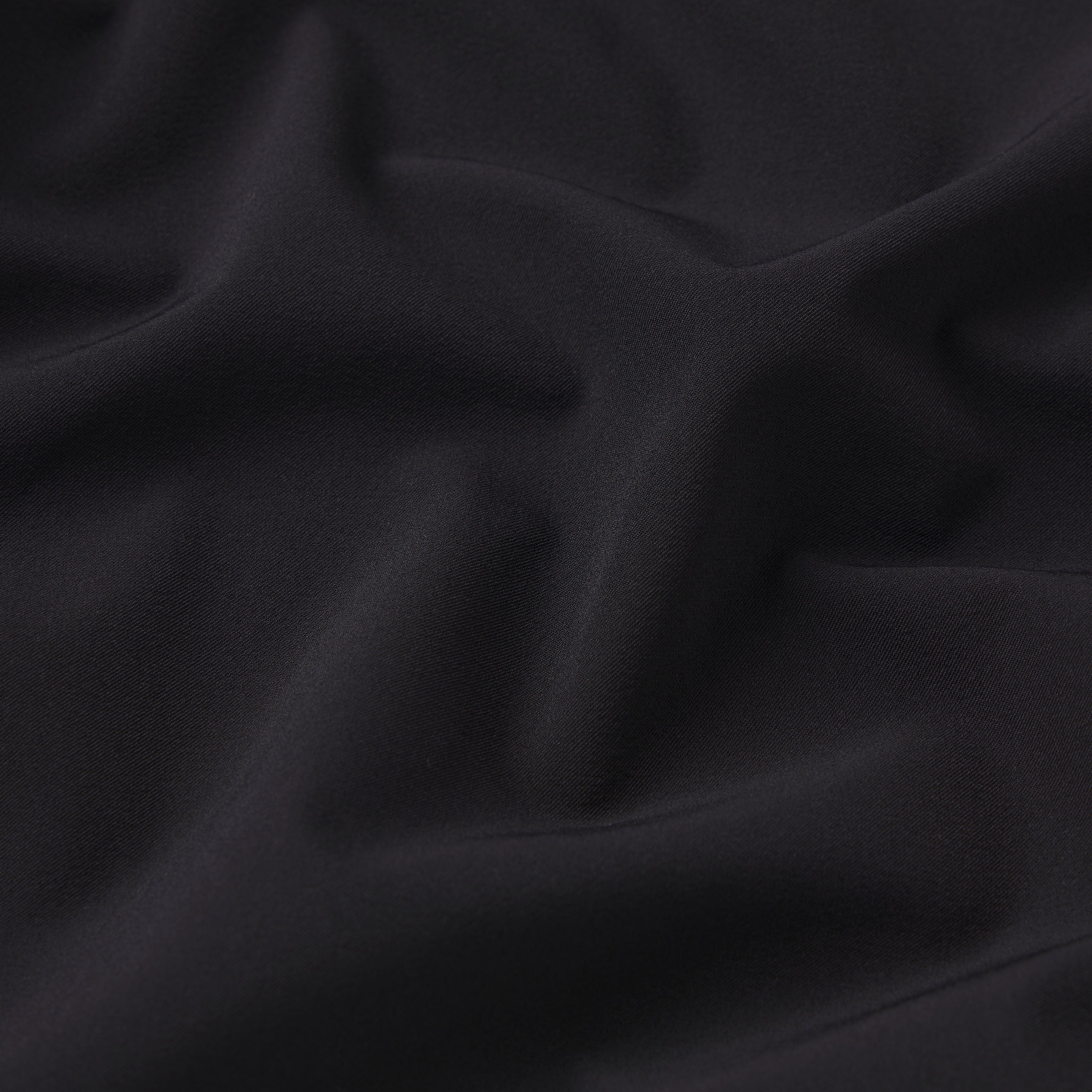 NikeSKIMS STRETCH NYLON OVERSIZED PANT | OBSIDIAN ADDITIONAL FABRIC DETAILS