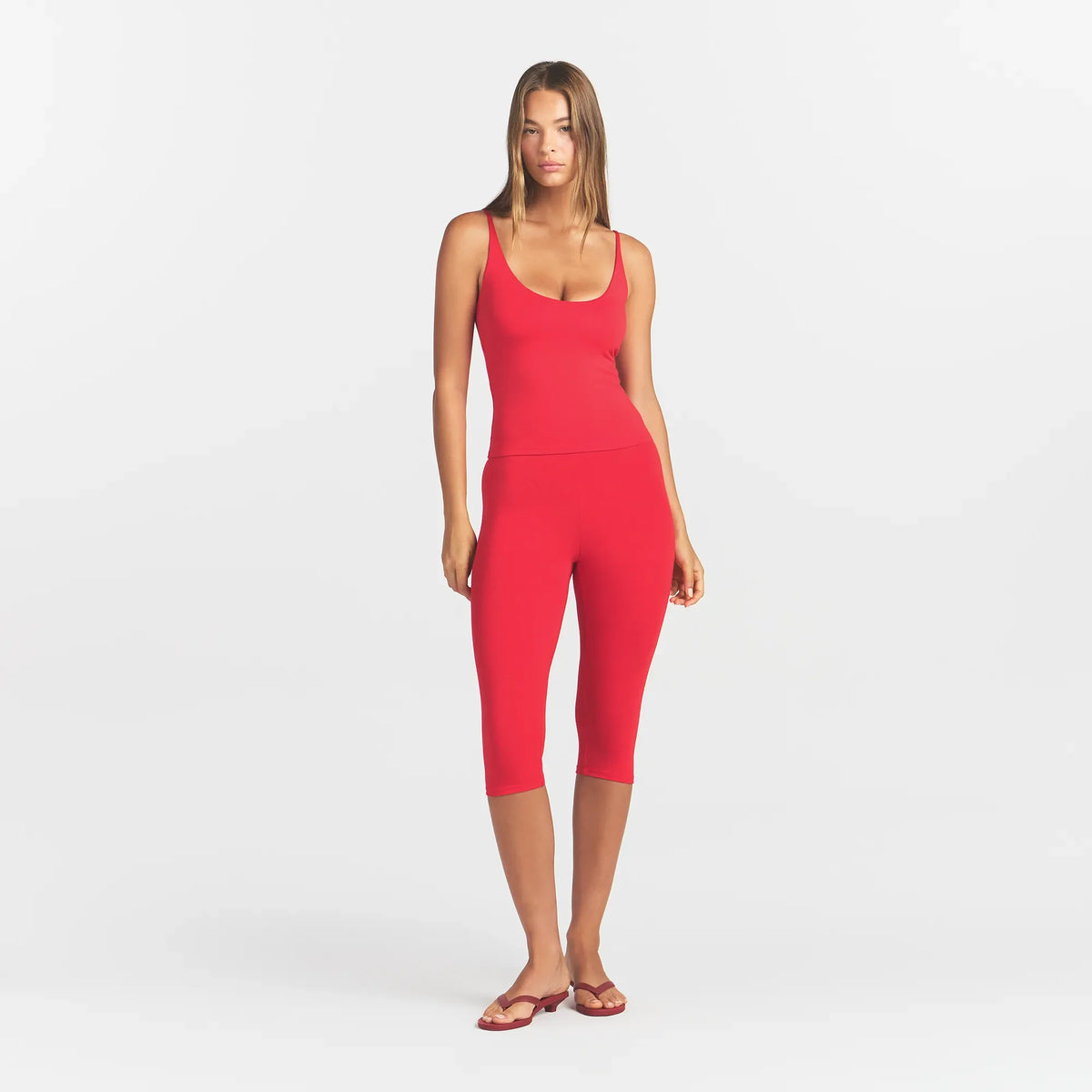 SMOOTH LAYERS SCOOP NECK CAMI | CARMINE ON A MODEL FRONT VIEW @ | FOCUS: 0.0, 1.0, 0.9