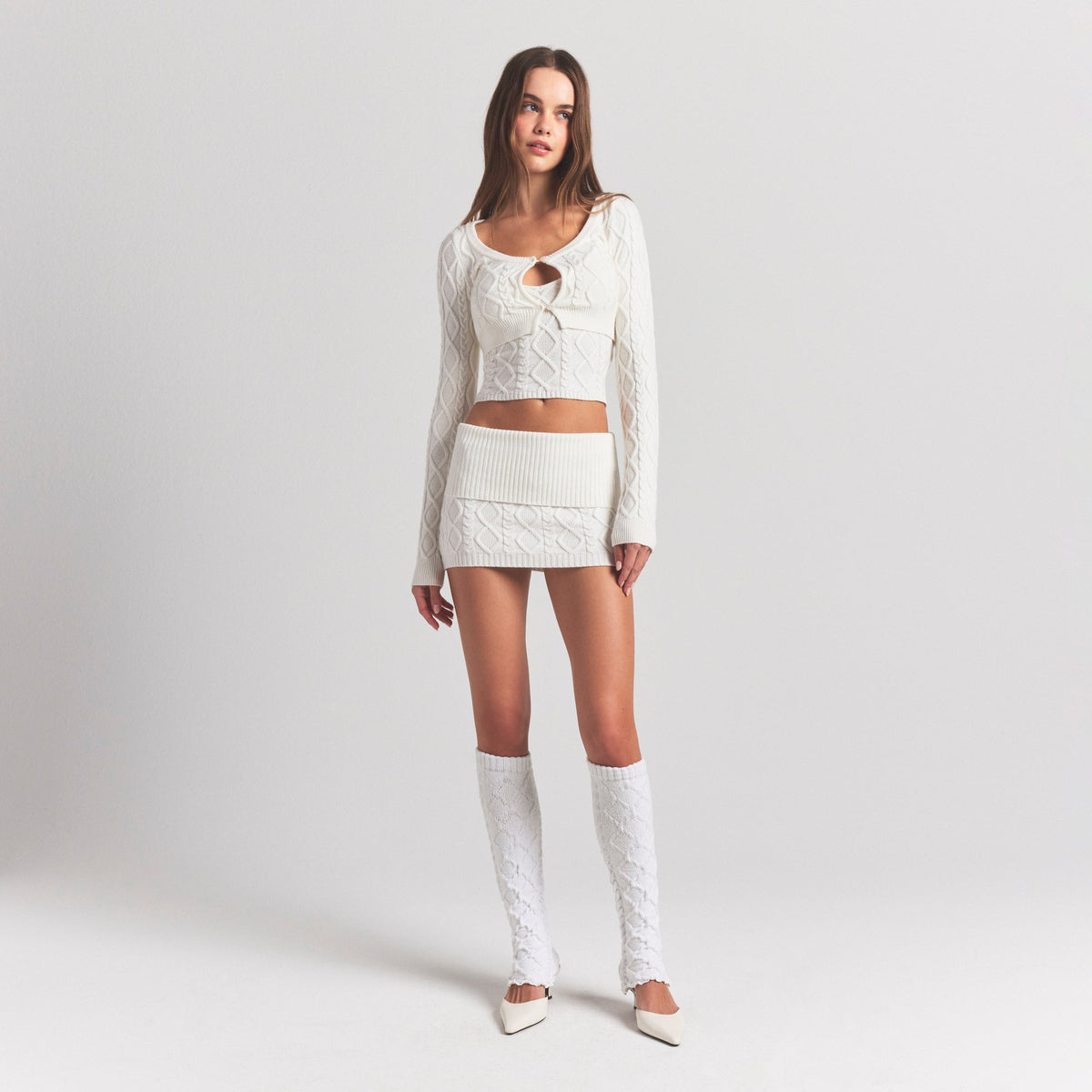 COZY CABLE LEG WARMERS | IVORY ON A MODEL FRONT VIEW @ | FOCUS: 0.0, 1.0, 0.9