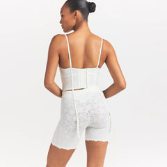 LACE SHAPEWEAR CORSET | IVORY ON A MODEL SIDE VIEW @