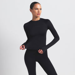 NikeSKIMS AIRY LONG SLEEVE CREW NECK TOP | OBSIDIAN ON A MODEL SIDE VIEW @ | FOCUS: 0.9, 0.1, 0.7