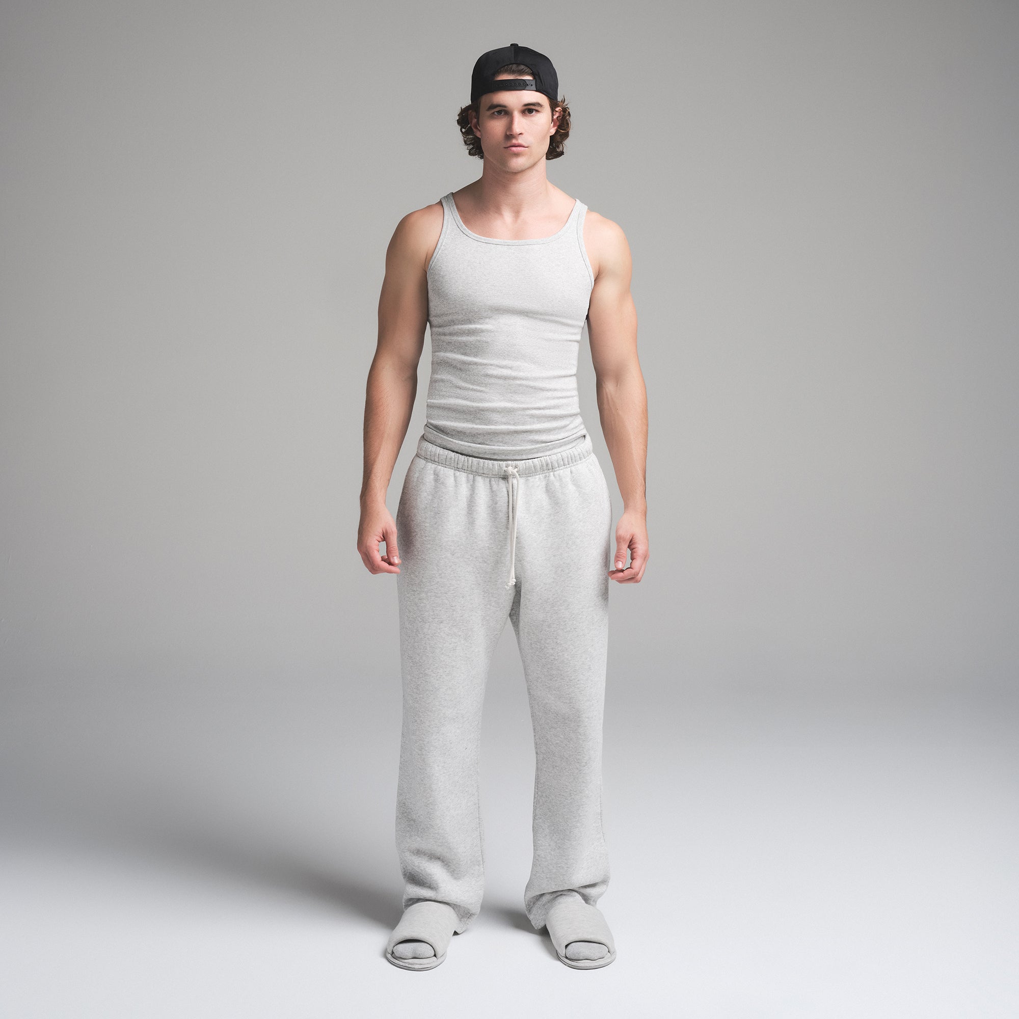 SKIMS COTTON MENS RIB TANK 3-PACK | HEATHER MULTI ON A MODEL FRONT VIEW | FOCUS: 0.0, 1.0, 0.9