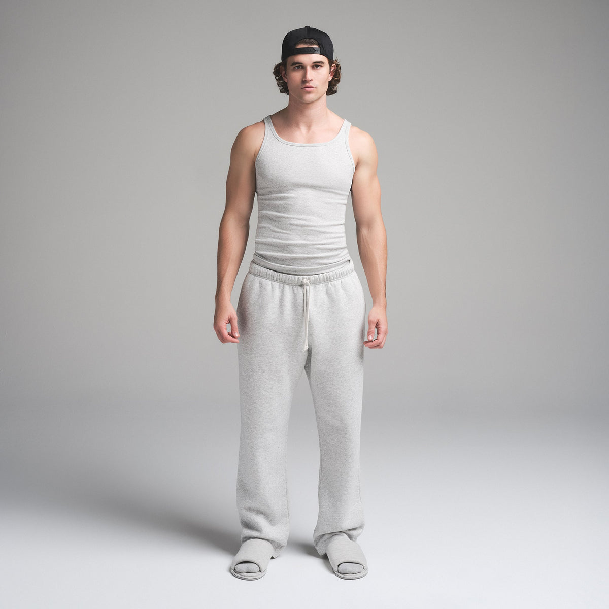 SKIMS COTTON MENS RIB TANK 3-PACK | HEATHER MULTI ON A MODEL FRONT VIEW | FOCUS: 0.0, 1.0, 0.9